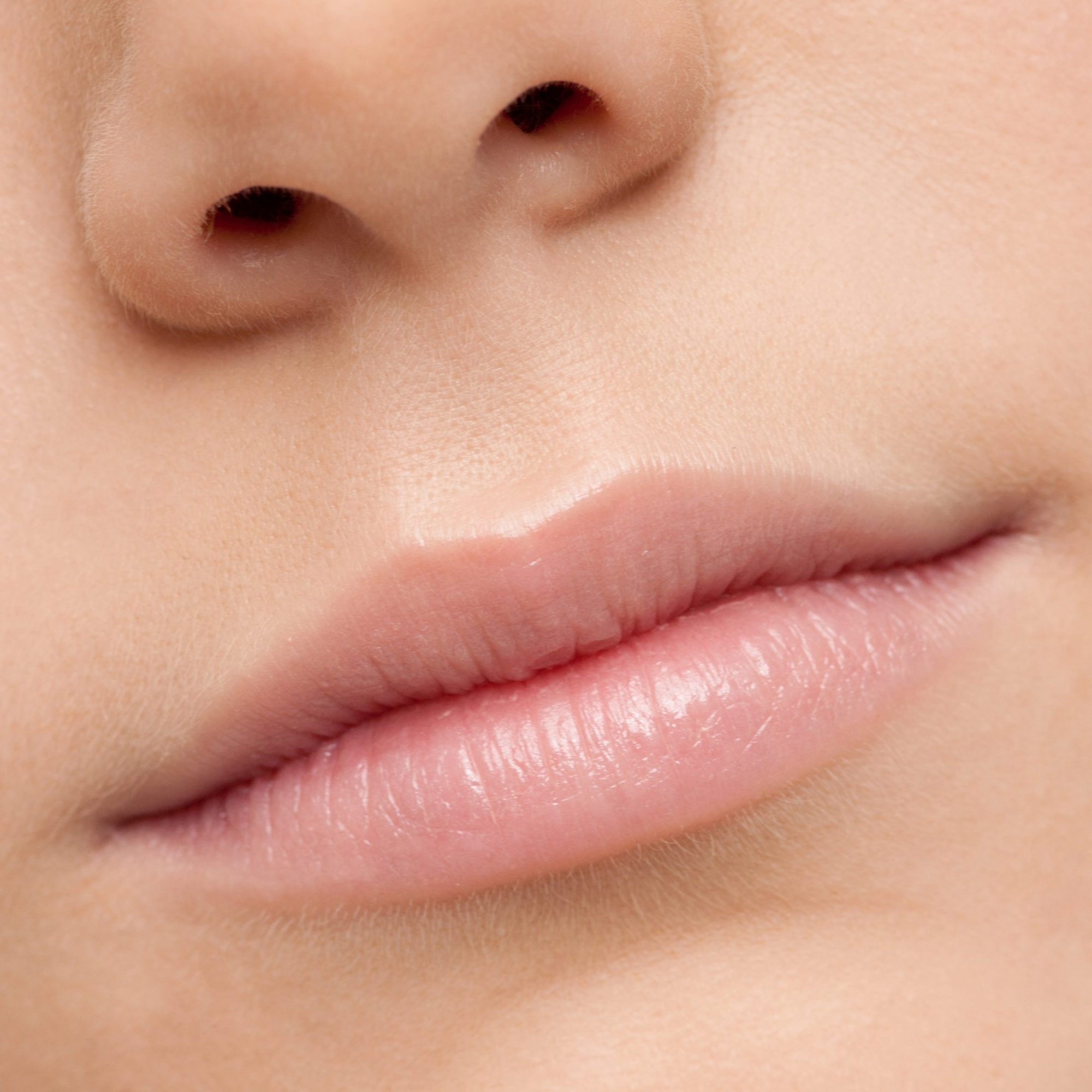 Close up shoot of young beautiful girl with perfect skin: makeup mouth zone. Lips.
